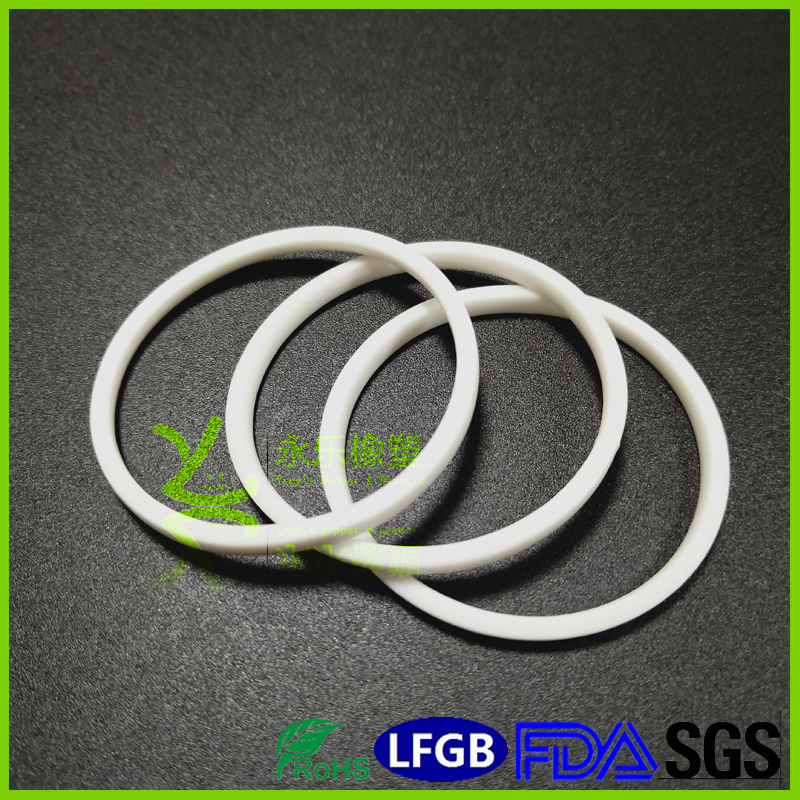 Adhesive silicone foam ring for lighting fixtures